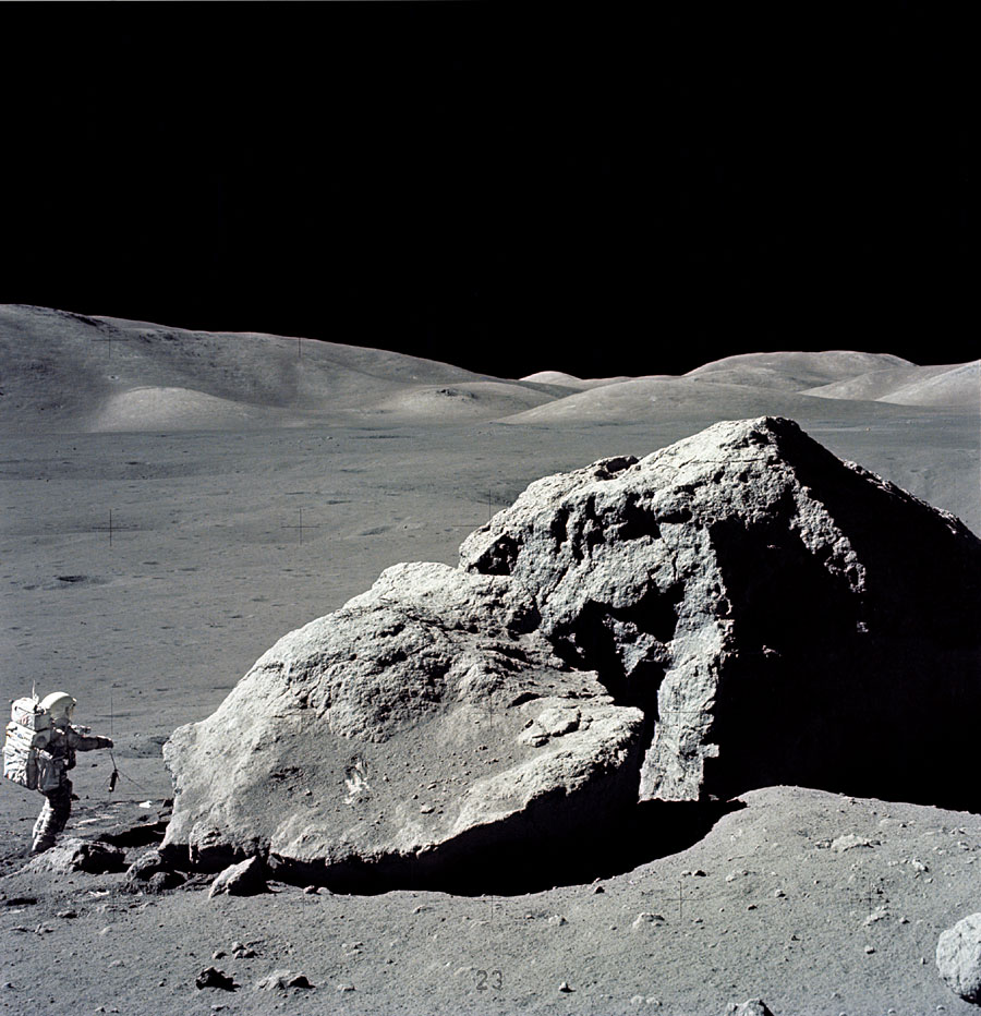 Schmidt next to large boulder